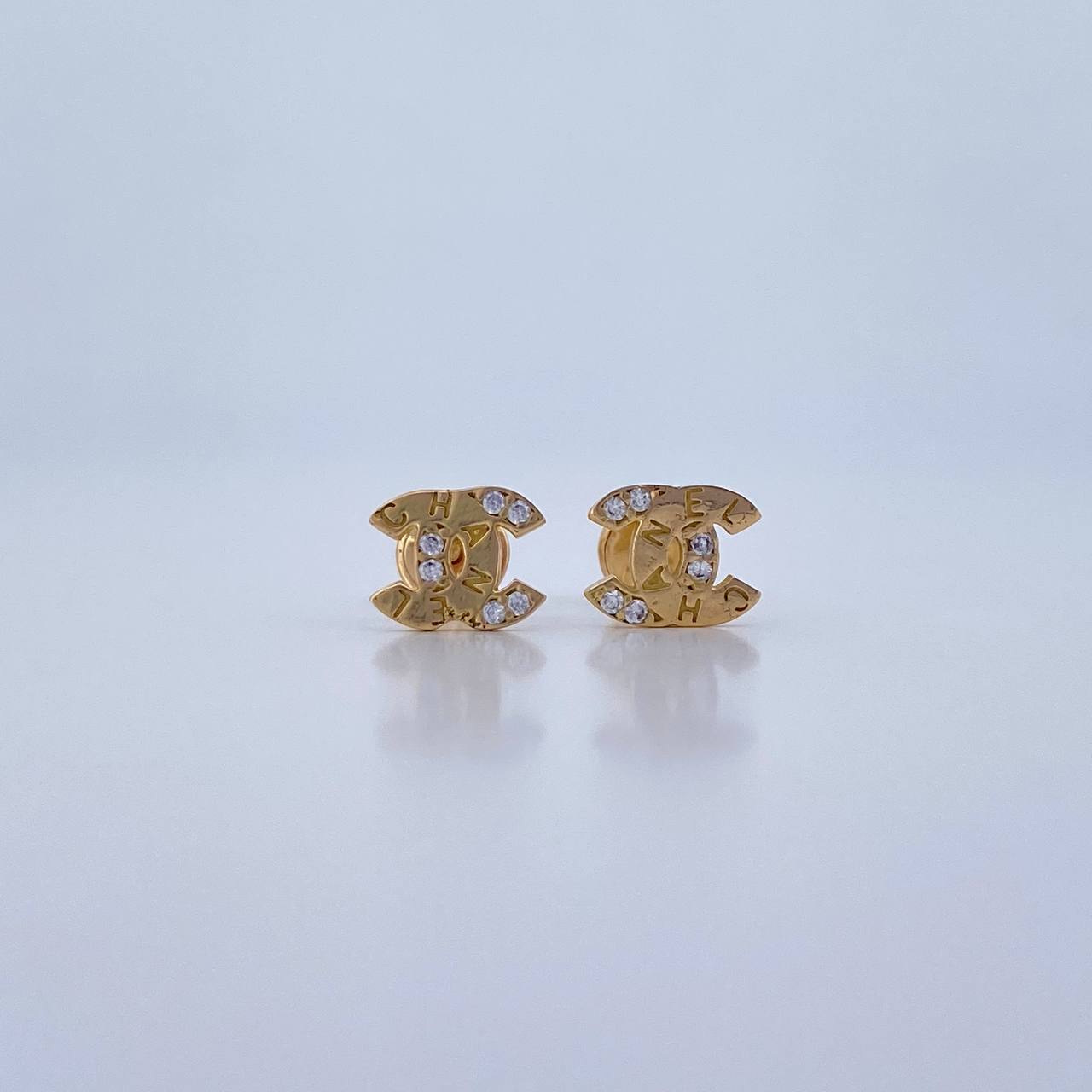 Topos Ola Cruzada 1.15gr / Circones Blancos Oro Amarillo 18K &