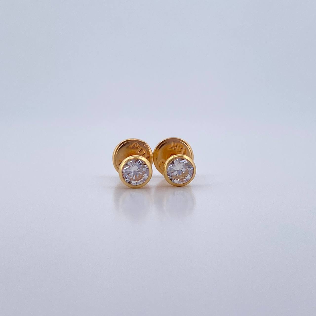 Topos Bisel 0.6gr / Circon Blanco Oro Amarillo 18K &