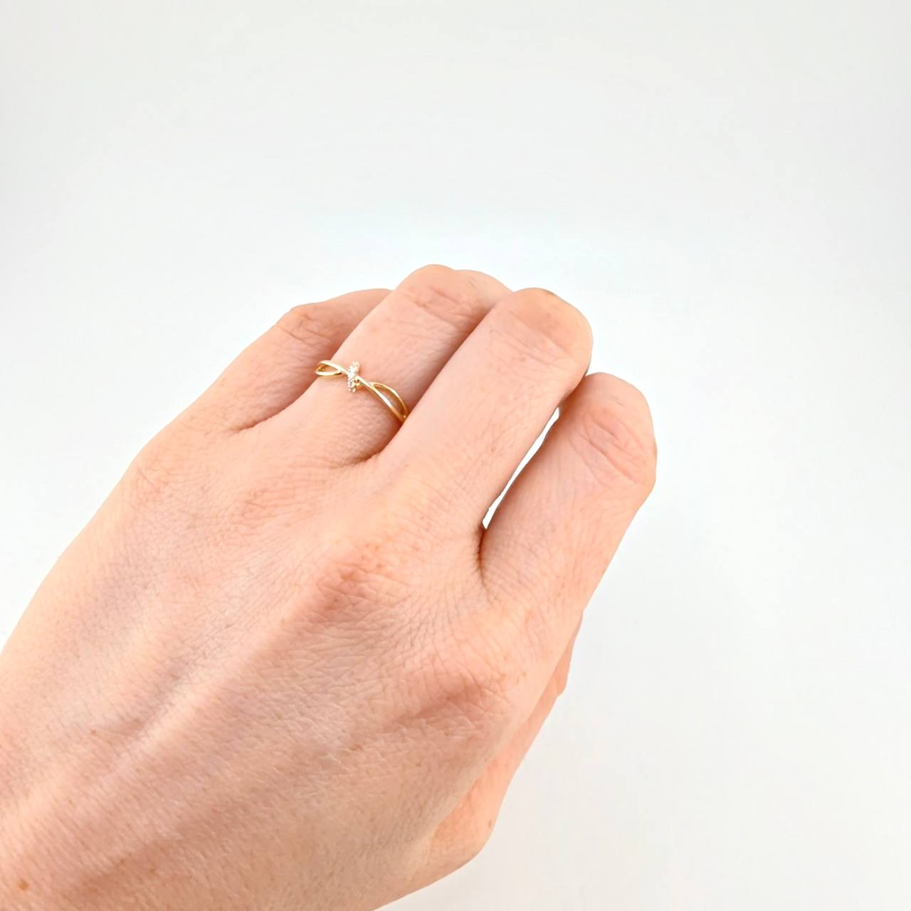 Intertwined Infinity Ring 1.25g / Size 6 1/2 Yellow Gold 18K