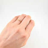 Intertwined Infinity Ring 1.25g / Size 6 1/2 Yellow Gold 18K