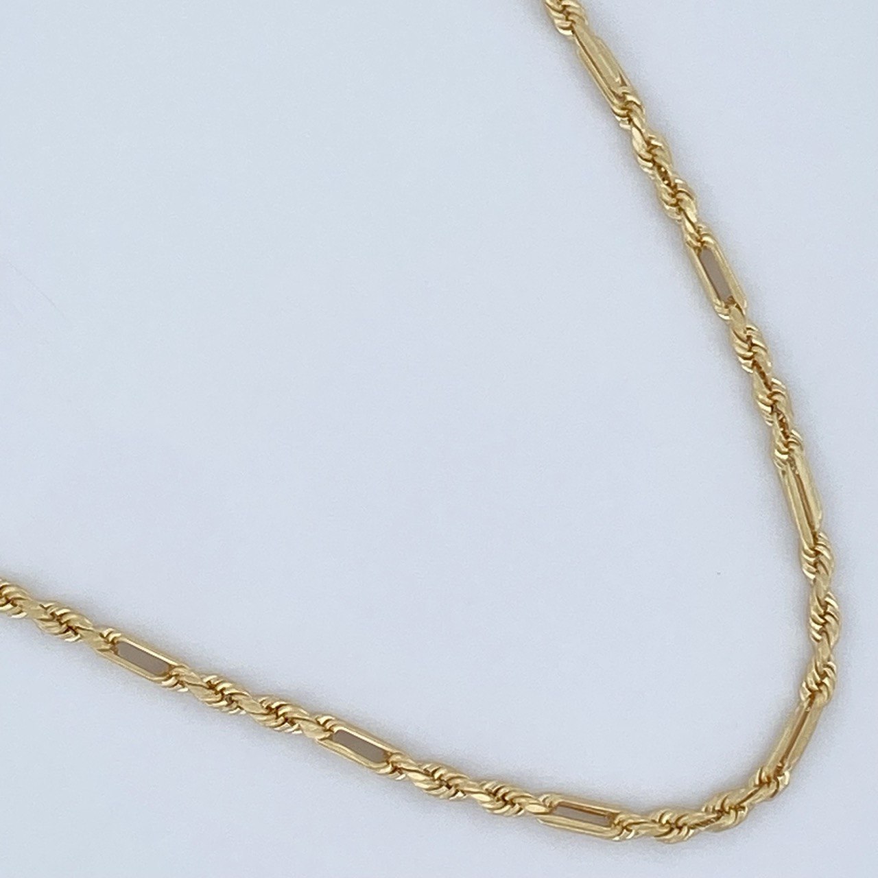 Cadena Lazo G 5.75gr / 24 in / Oro Amarillo +3 18K +