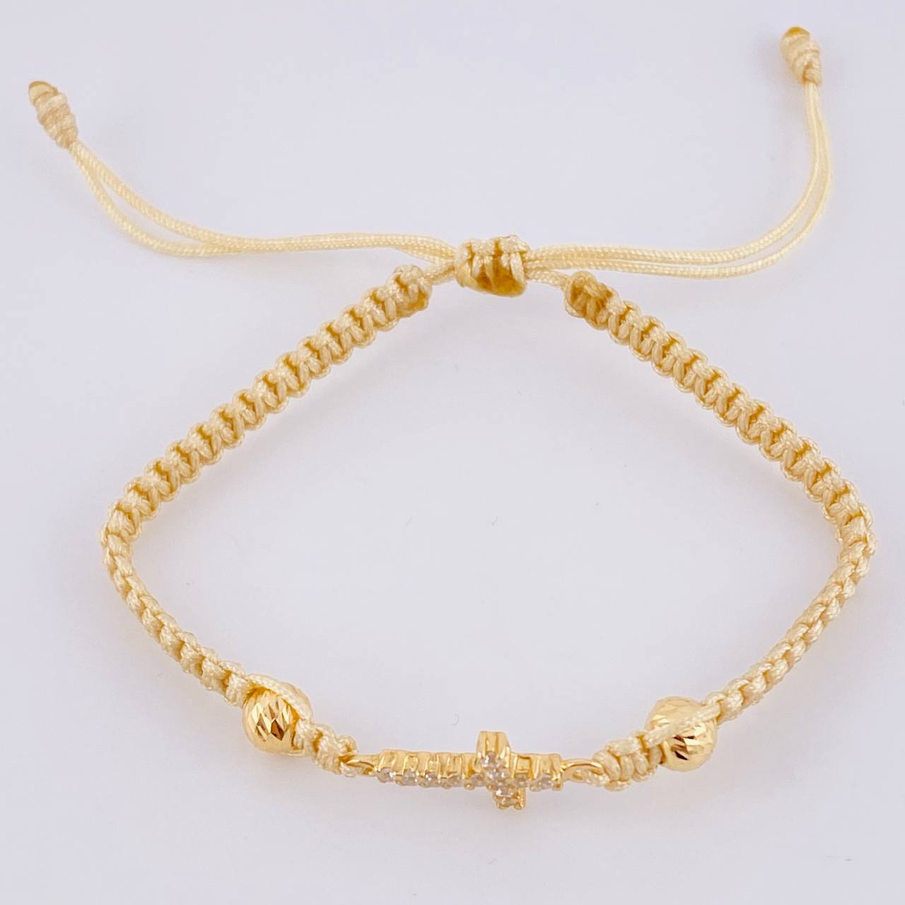 Pulsera Tejida Beige Cruz Maraquera Oro Amarillo 18K
