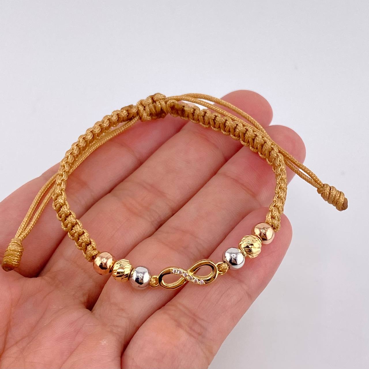 Pulsera Tejida Cafe Herraje Infinito 4 Und 5Mm Lisas / 2 Und 5Mm Diamantadas Tres Oros 18K