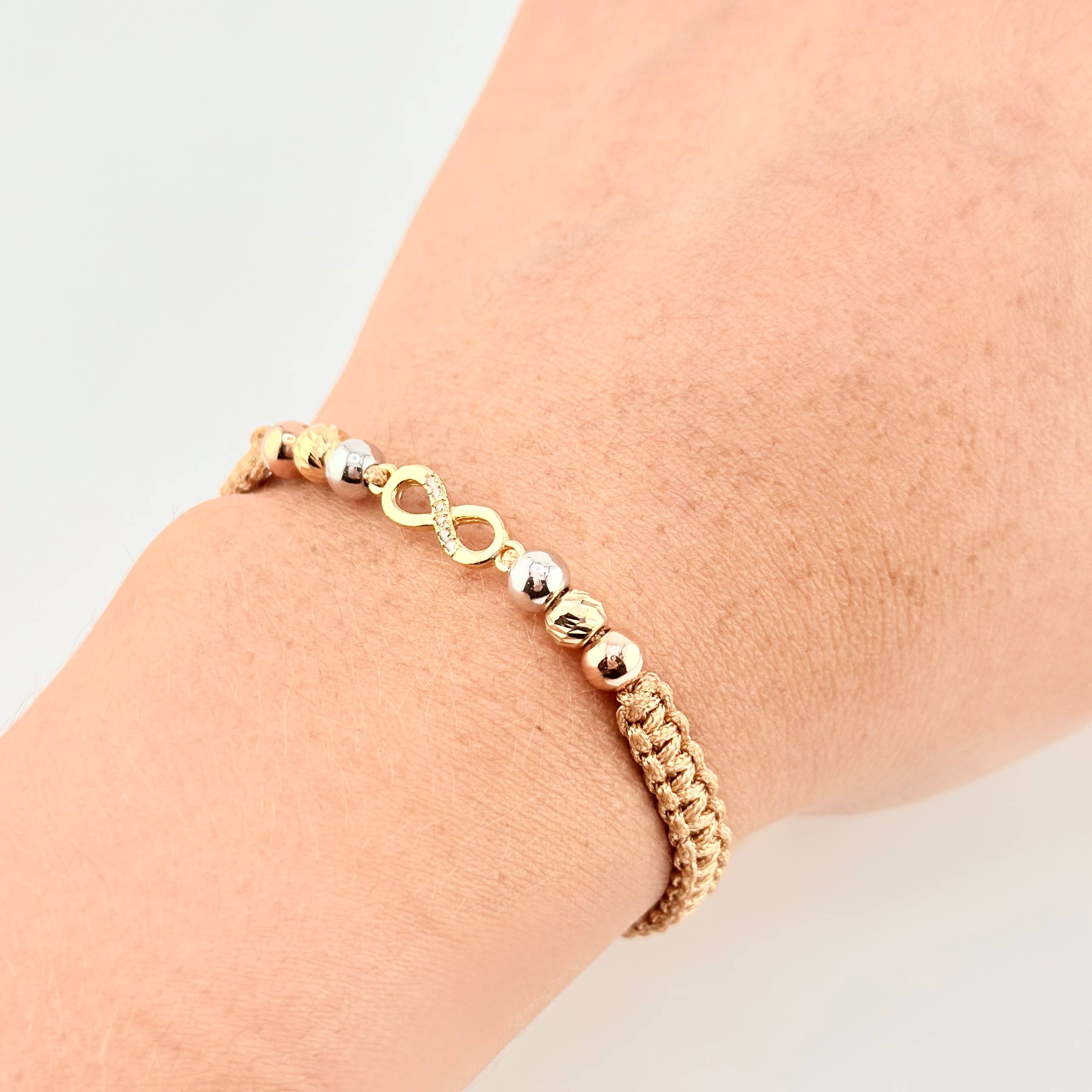 Pulsera Tejida Cafe Herraje Infinito 4 Und 5Mm Lisas / 2 Und 5Mm Diamantadas Tres Oros 18K