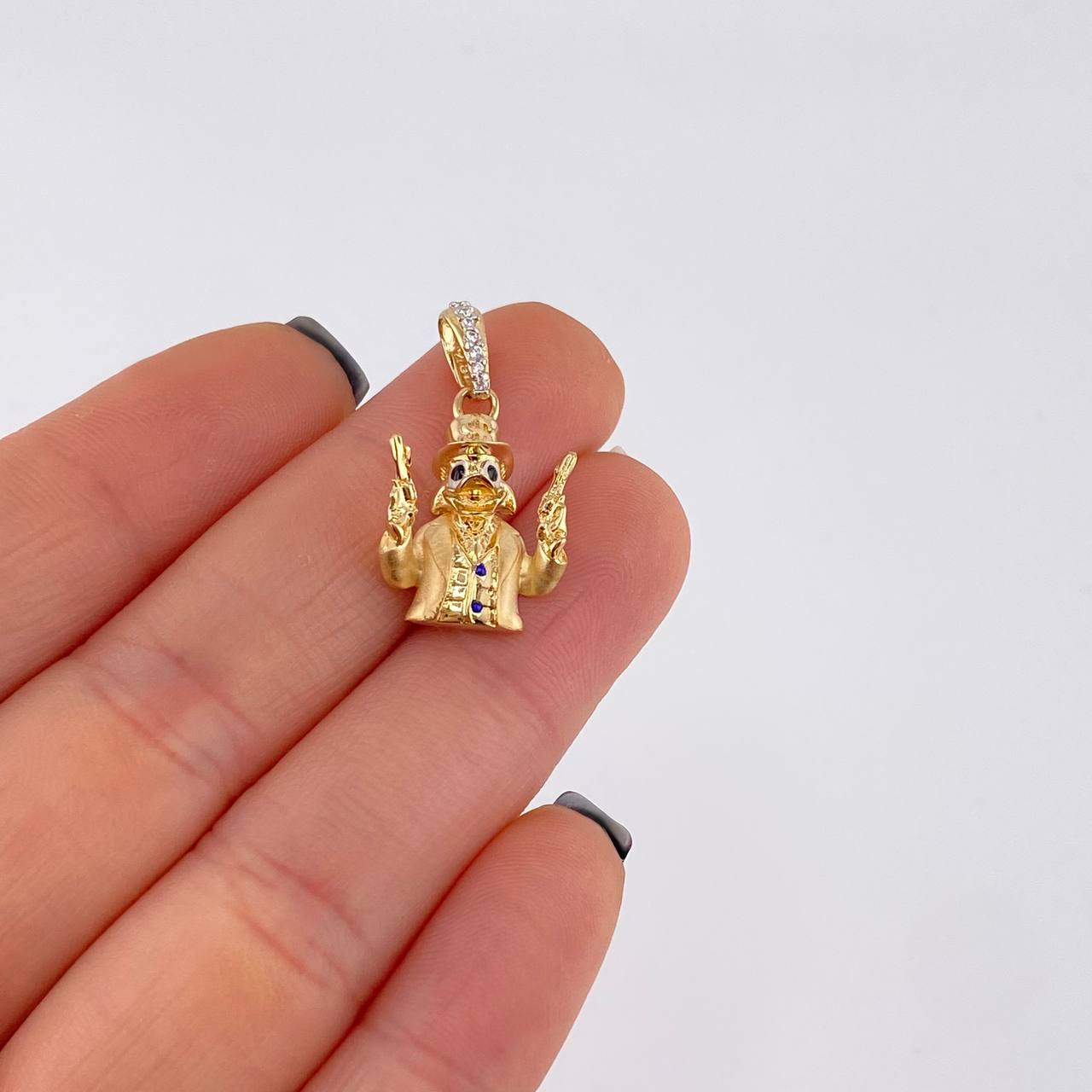 Dije Pato pistolas 2.4g / 1 in Oro Amarillo 18K