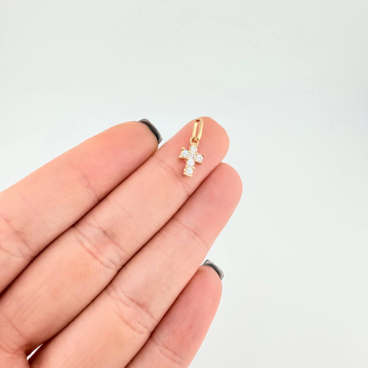 Dije Cruz Cuatro Garras 0.65g / 1/2 in Oro Amarillo 18K