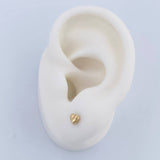 Stud Earrings 0.5gr / 18K Gold $