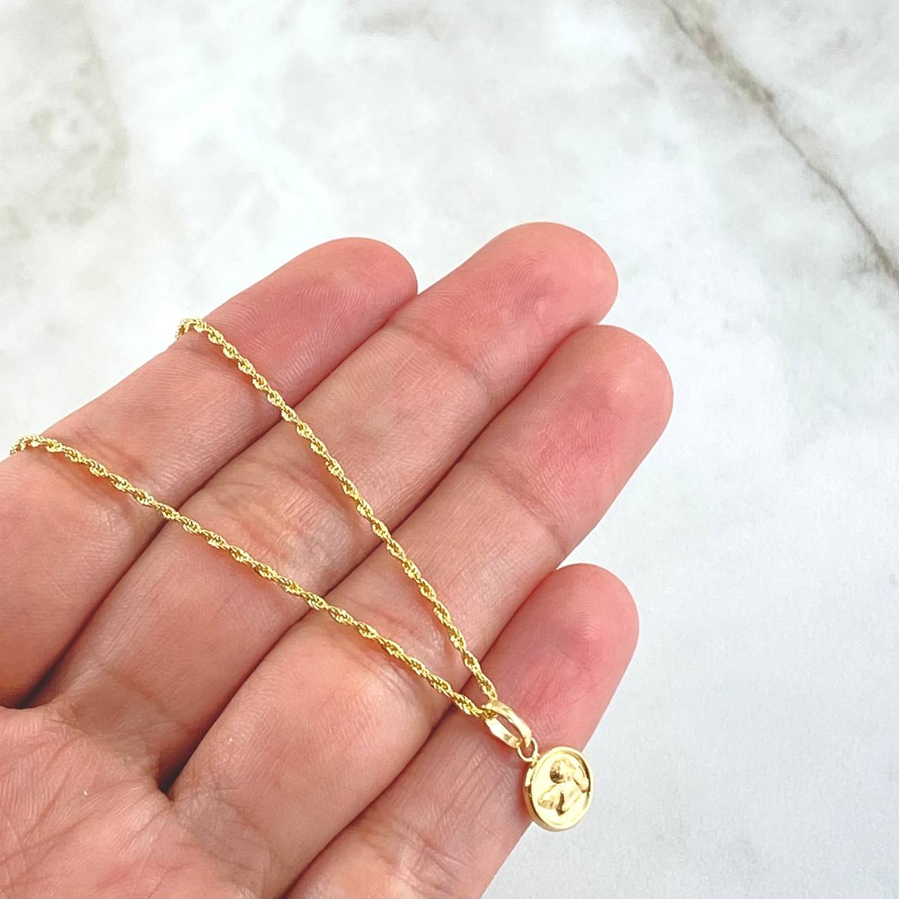 Set Rope Chain 1gr / 50cm / 1.2mm + Pendant Guardian Angel 0.45gr / 1.5cm Matte Circle 1.45gr 18K Yellow Gold (Offer)