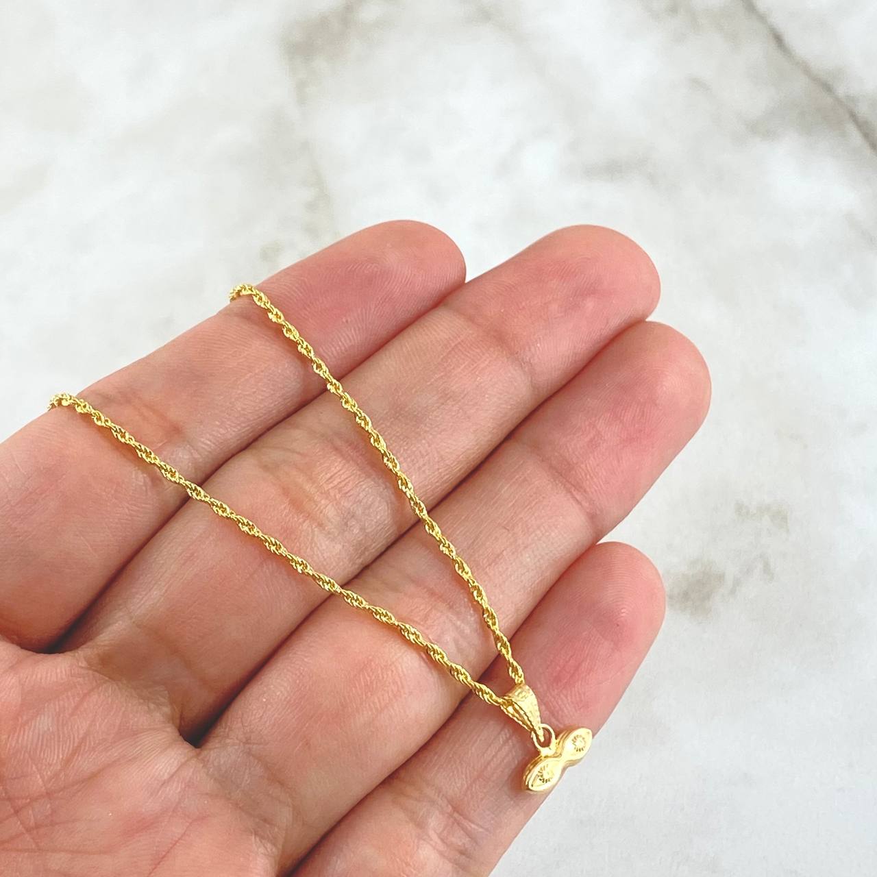Set Rope Chain 1gr / 50cm / 1.2mm + Pendant Santa Lucia Eyes 0.35gr / 1.1cm Matte 1.35gr 18K Yellow Gold (Offer) *
