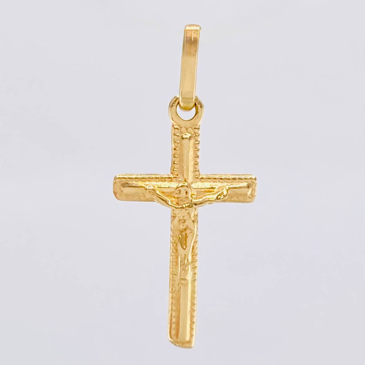 Dije Cruz Cristo 0.9 g / 1 in Oro Amarillo 18K