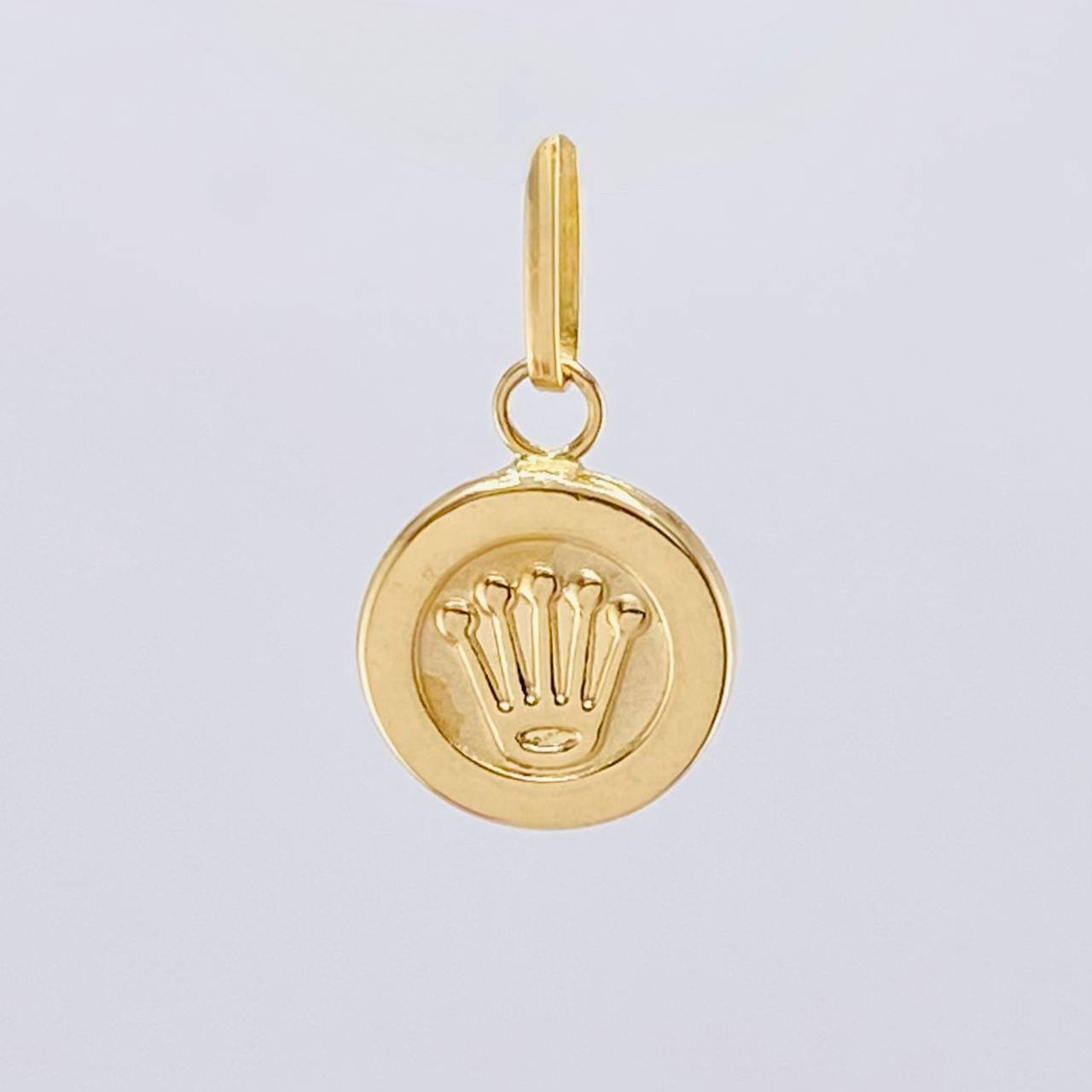 Dije Corona 0.8 g / 3/4 in Oro Amarillo 18K