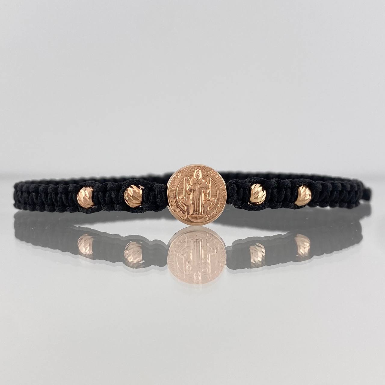 Pulsera Tejida Negra San Miguel Oro Rosa 18K