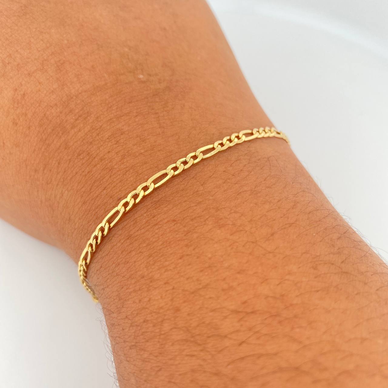 Pulso Figaro 1.7gr / 18.6cm / 2.7mm Oro Amarillo +1 18K $