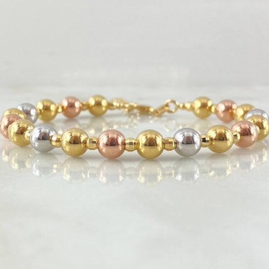 Bracelet Hoop Beads Interspersed 6.85gr / 7 3/4 in / Three Golds +4 18K ©