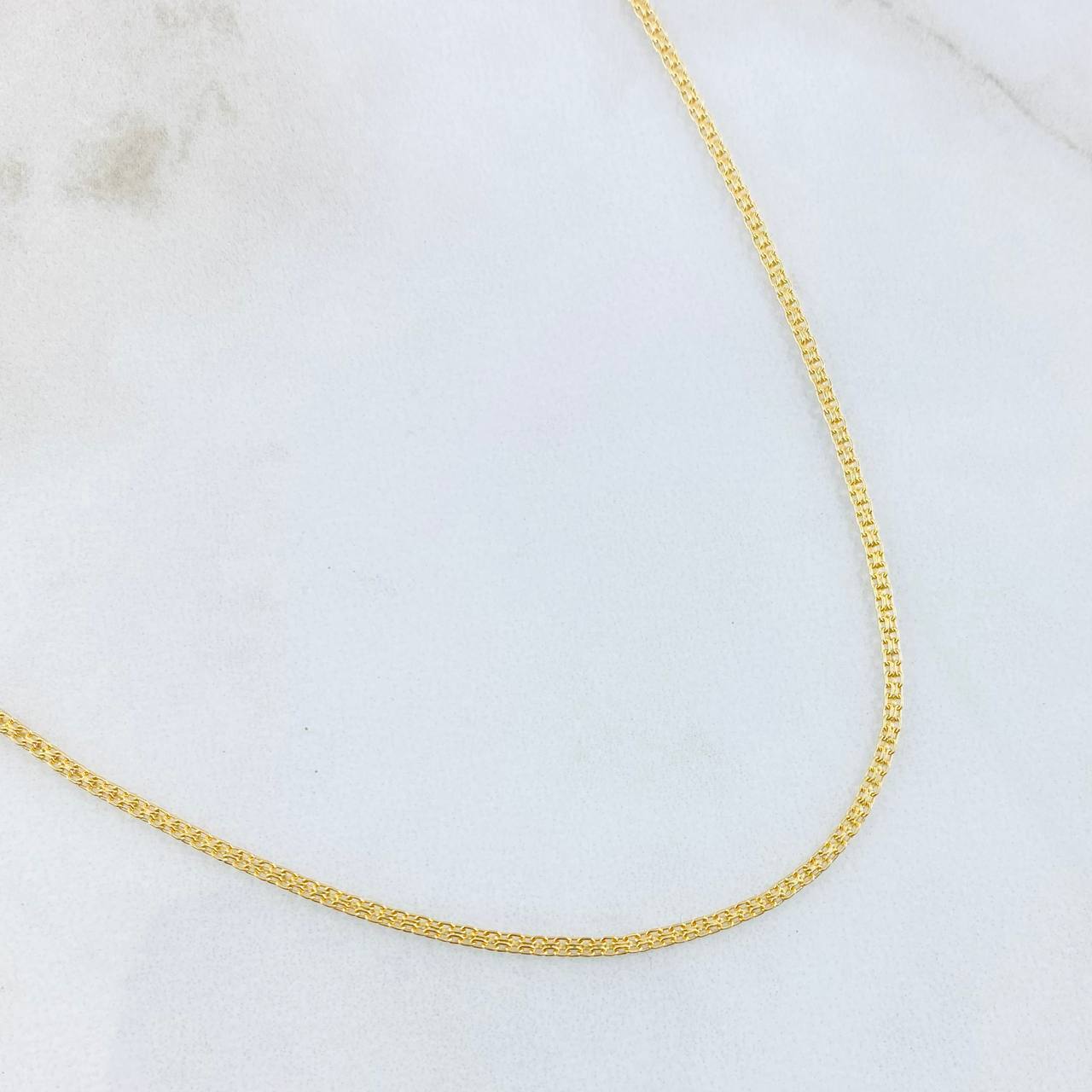 Cadena China 3.1gr / 23 1/2 in / 1.4mm Oro Amarillo +1 18K *