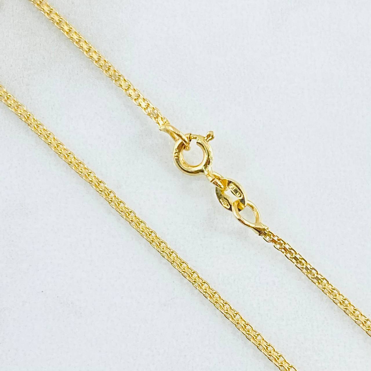 Cadena China 3.35gr / 23 1/2 in / 1.4mm Oro Amarillo +1 18K