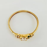 Anillo Solitario Flores Delicadas 0.9gr / T5 / Oro Amarillo 18K