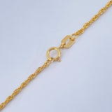 Set Cadena y Dije Lazo + Corazon  1,55gr / Oro Amarillo 18K &