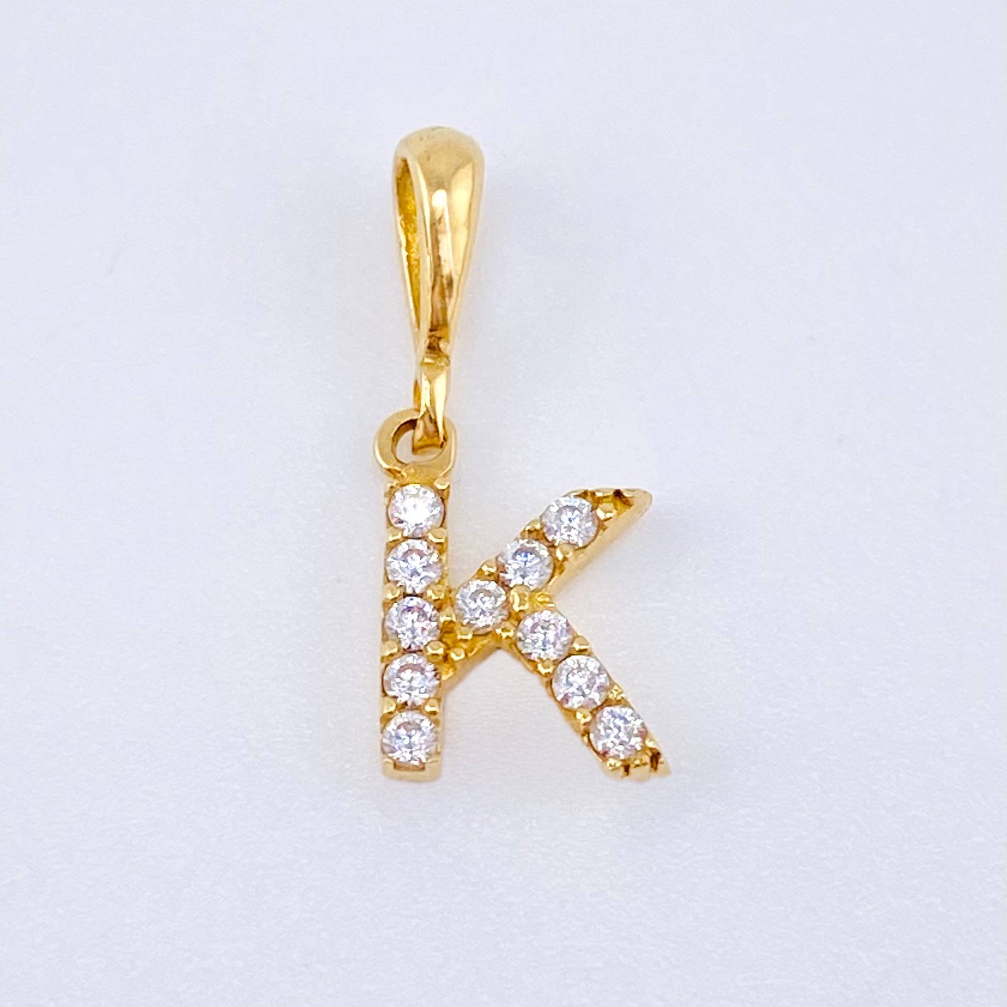 Dije Letra K 0.6gr / 1/2 in / Oro Amarillo 18K *