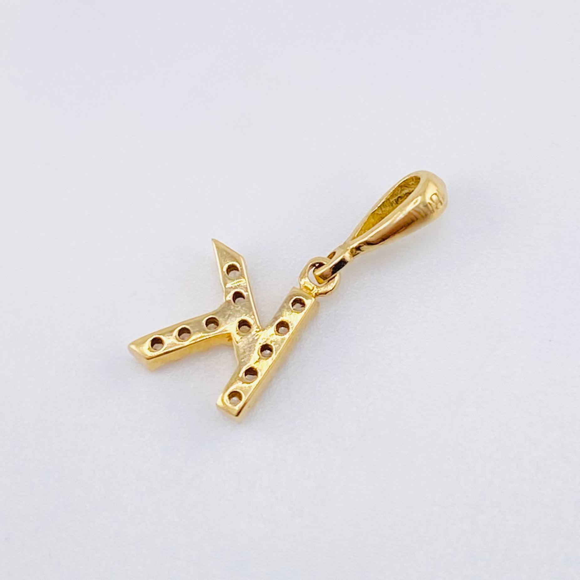 Dije Letra K 0.6gr / 1/2 in / Oro Amarillo 18K *