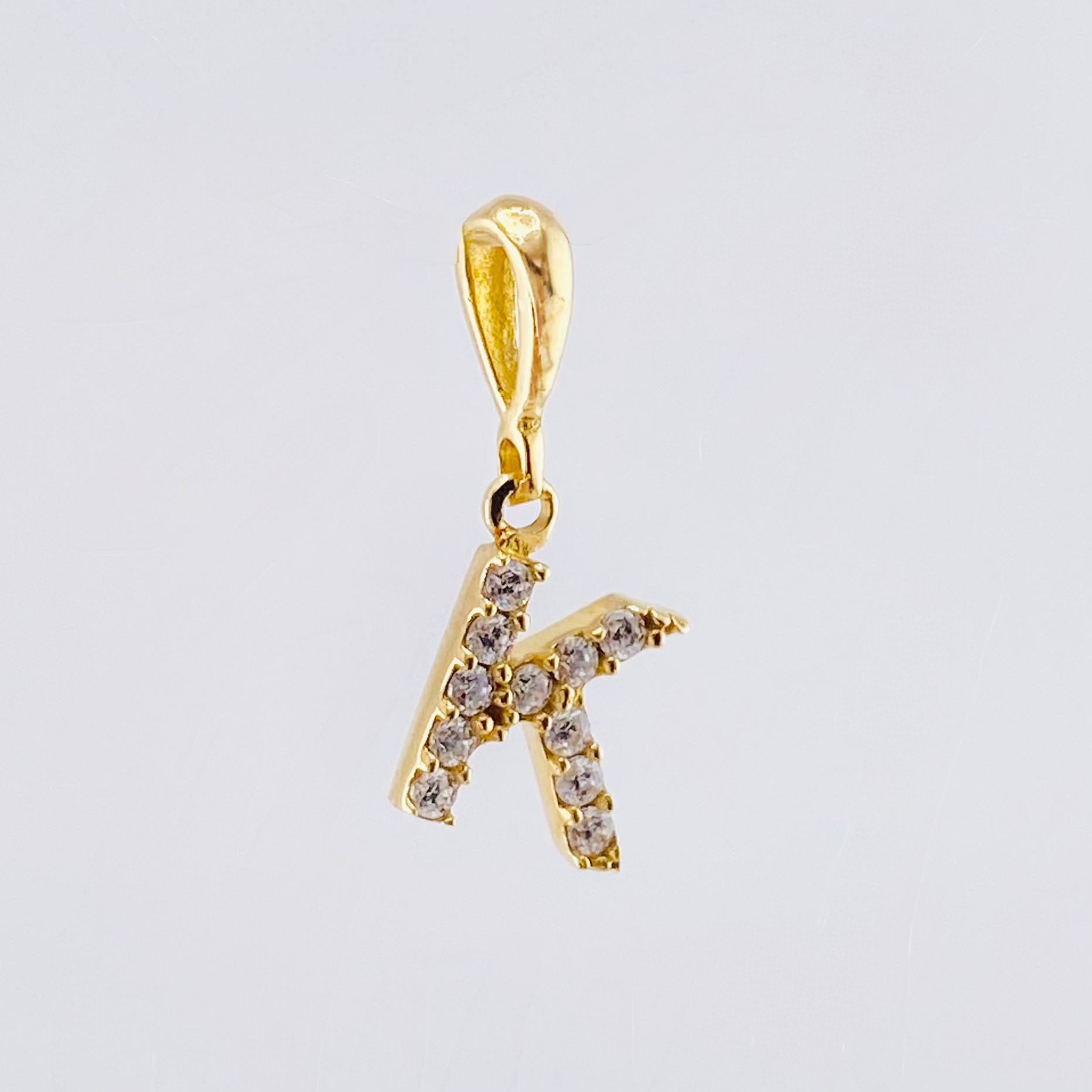 Dije Letra K 0.6gr / 1/2 in / Oro Amarillo 18K *