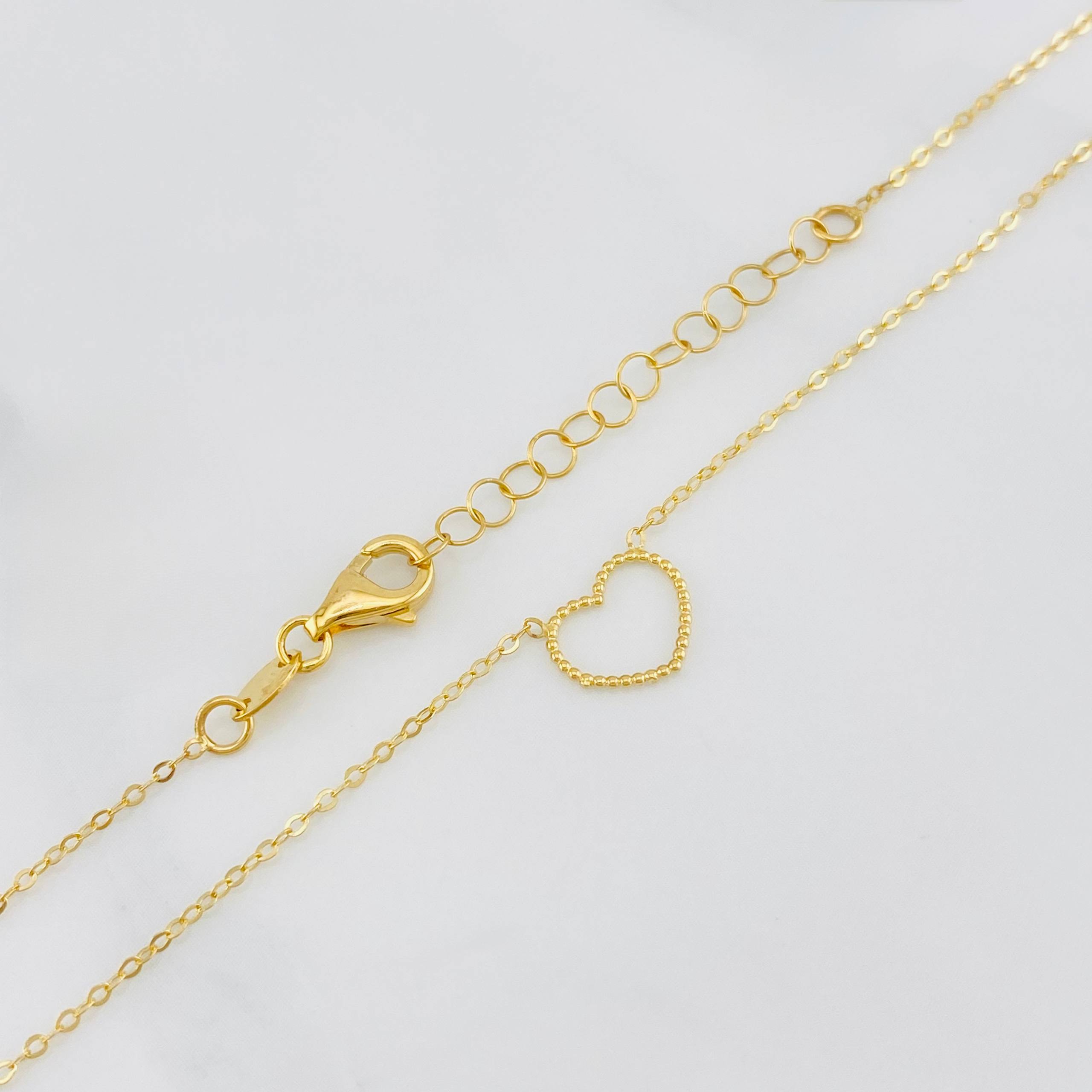 Cadena Aro seguido silueta corazón 1.3g / 18 in / 1mm Oro Amarillo 18K