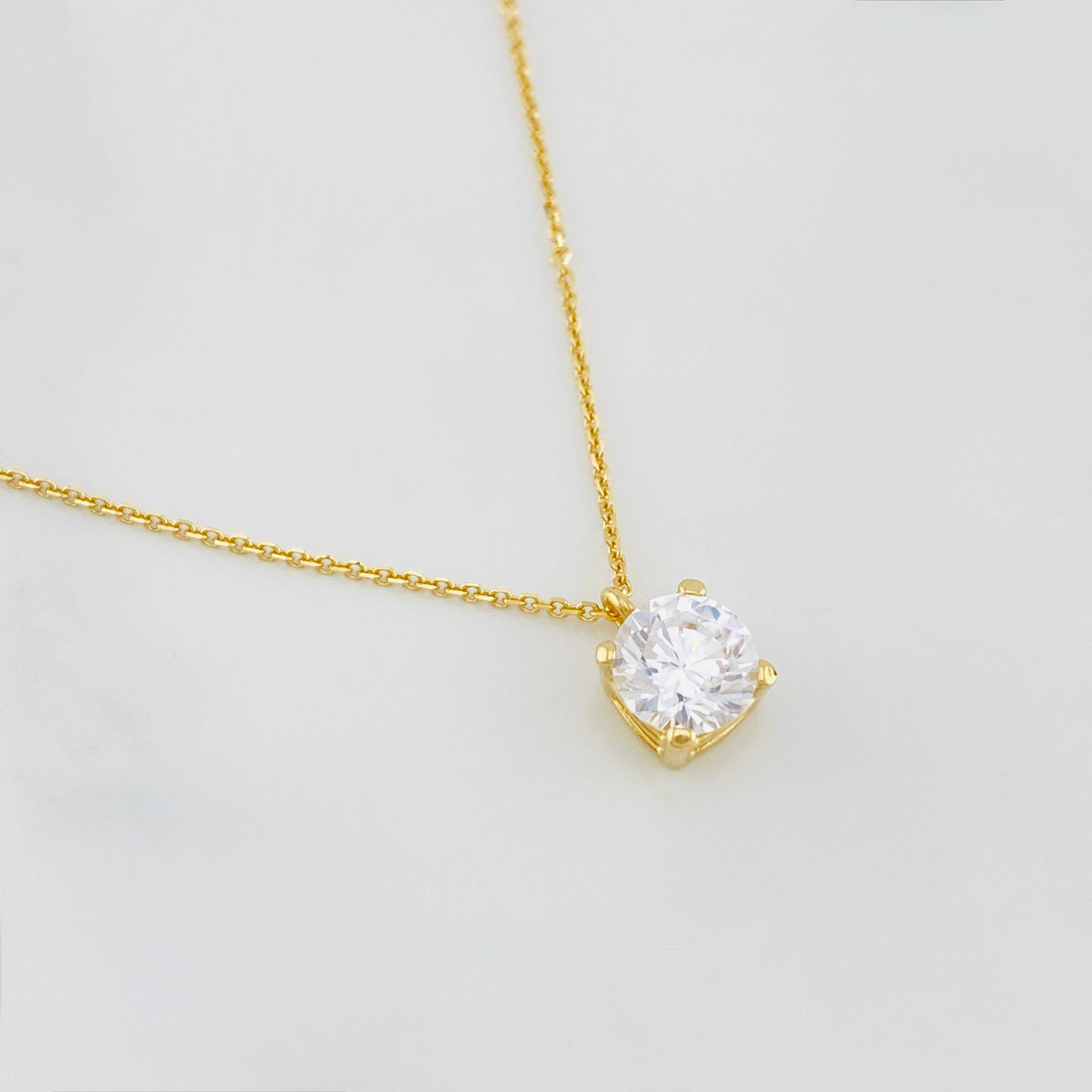 Cadena Aro seguido cuatro garras 2.1g / 17 3/4 in- 16 1/2in / 0.6mm Oro Amarillo 18K