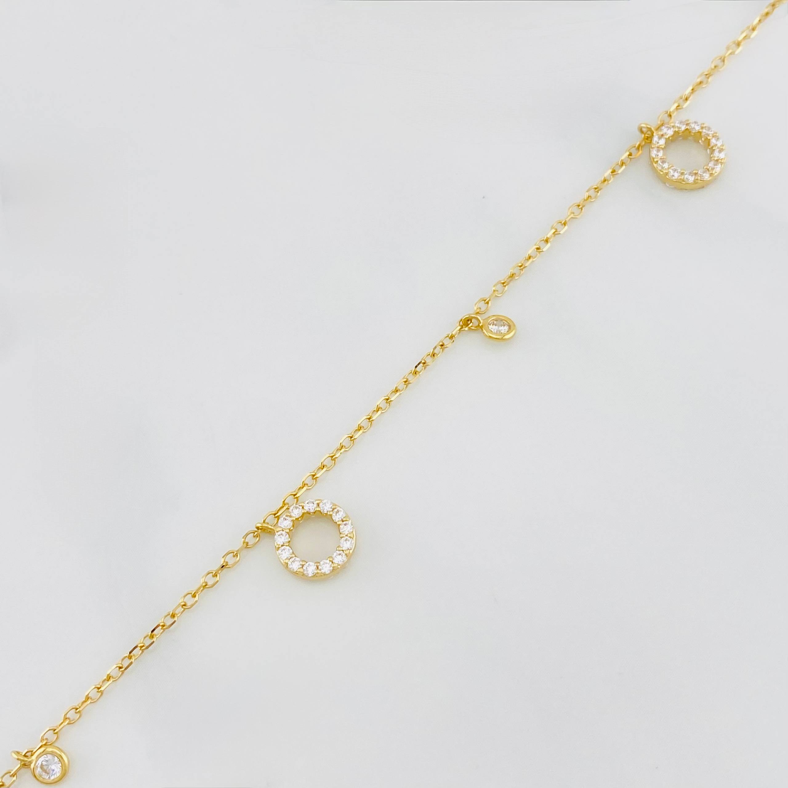 Tobillera Aro seguido círculos 3g / 9 3/4 in-9 in / 1.3mm Oro Amarillo 18K