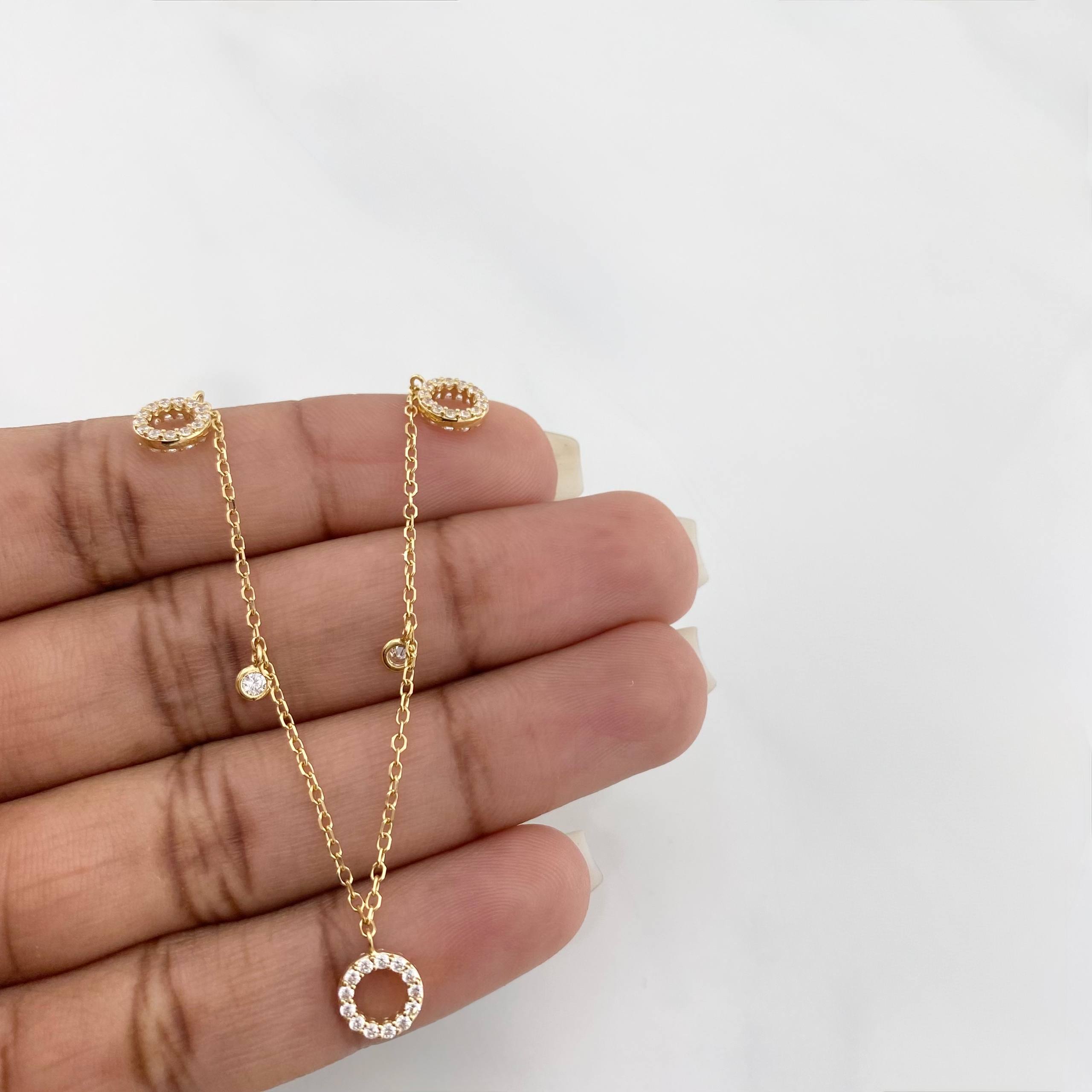 Tobillera Aro seguido círculos 3g / 9 3/4 in-9 1/4 in / 1.2mm Oro Amarillo 18K