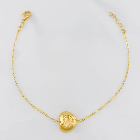 Bracelet Hoop followed by heart 1.85g / 7 1/2 in-6 3/4 in / 1.4mm 18K Yellow Gold