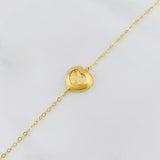 Tobillera Aro seguido corazón 1.85g / 7 1/2 in-6 3/4 in / 1.4mm Oro Amarillo 18K