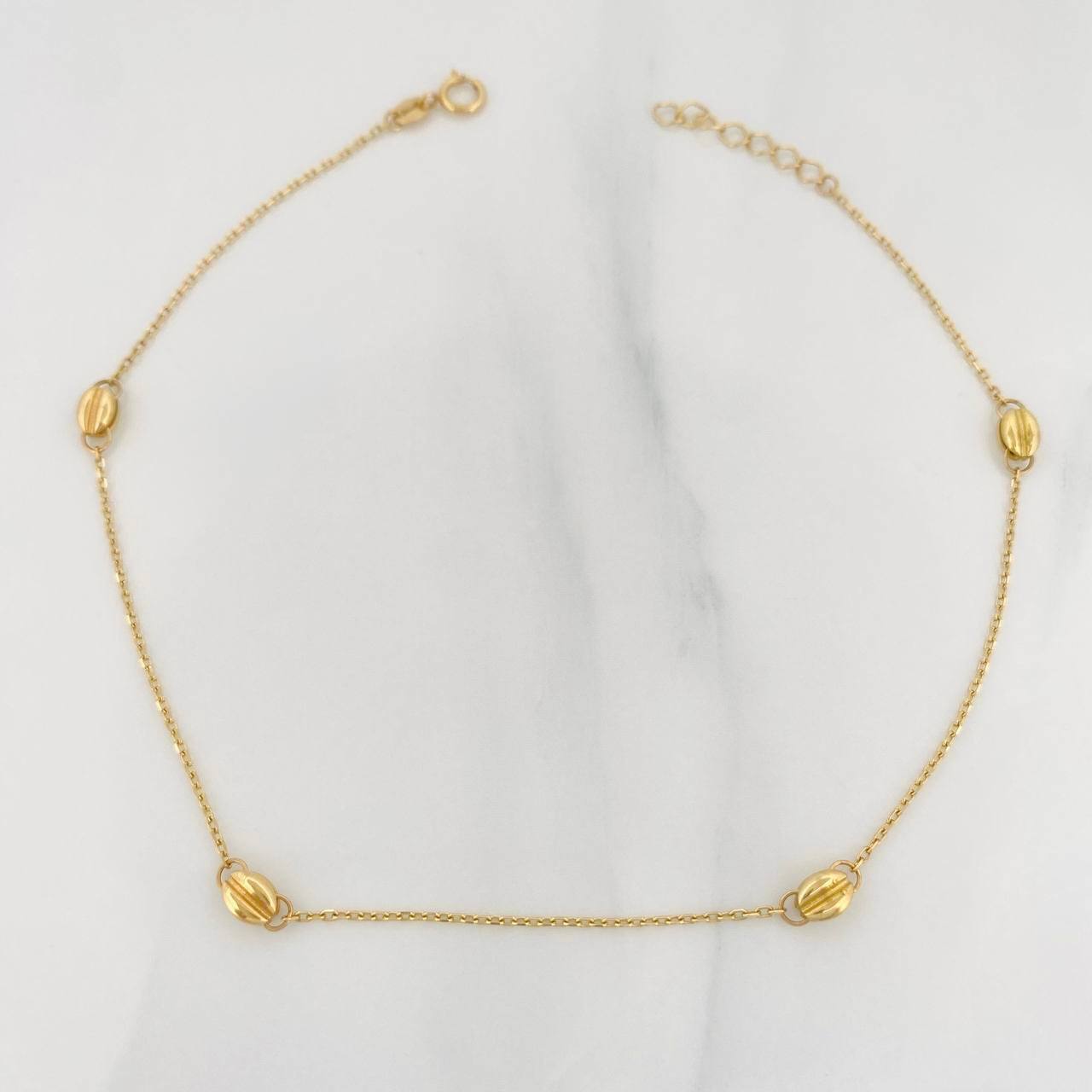 Tobillera Aro Seguido Cafe 1.75g / 9 3/4 in / 1.3mm Oro Amarillo 18K