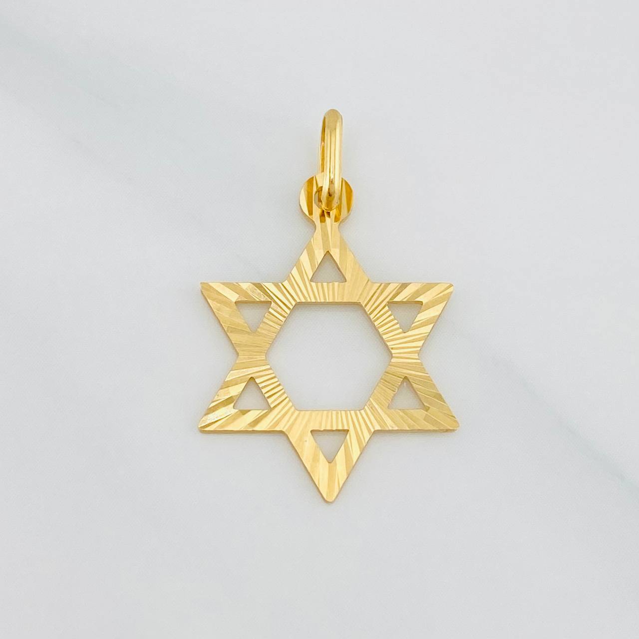 Dije Estrella de david 1.1g / 1 in Oro Amarillo 18K