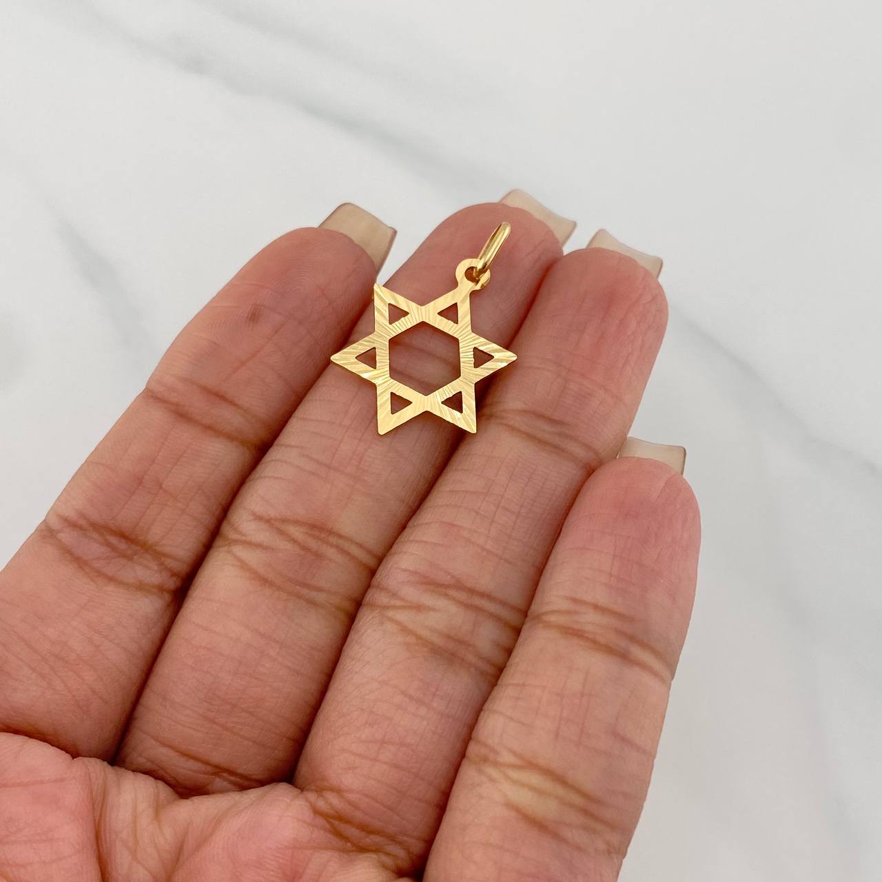 Dije Estrella de david 1.1g / 1 in Oro Amarillo 18K