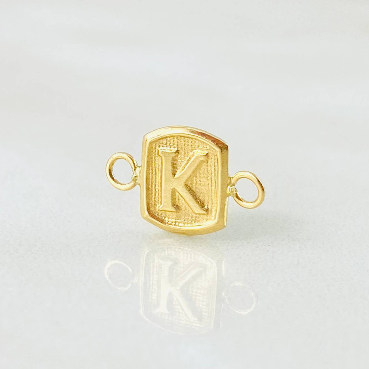 Herraje Letra K 0.25gr / 1/2 in / Oro Amarillo 18K