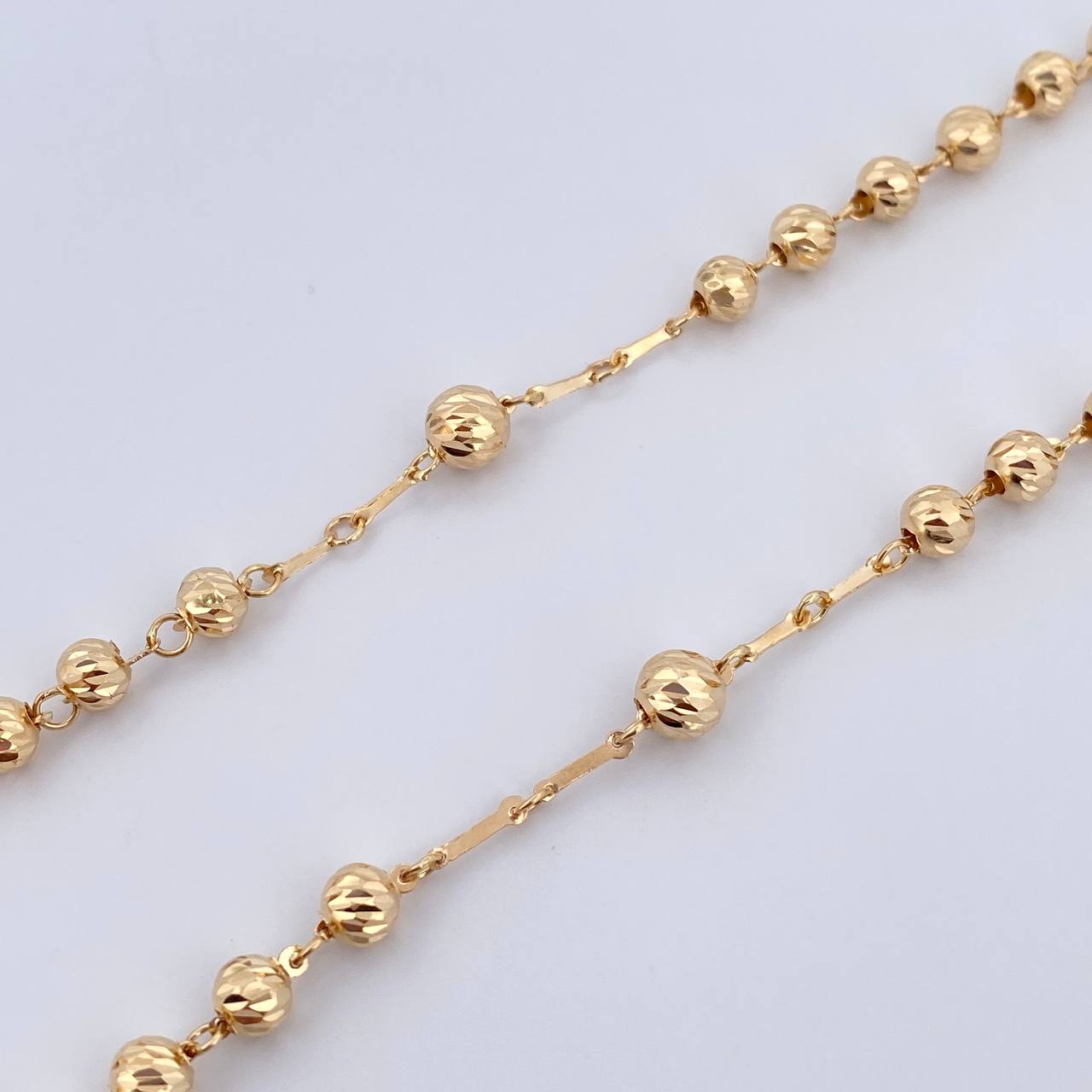 Rosario Virgen Milagrosa 15.6gr / 62cm / 5mm-6mm Bolas Diamantadas Oro Amarillo 18K $