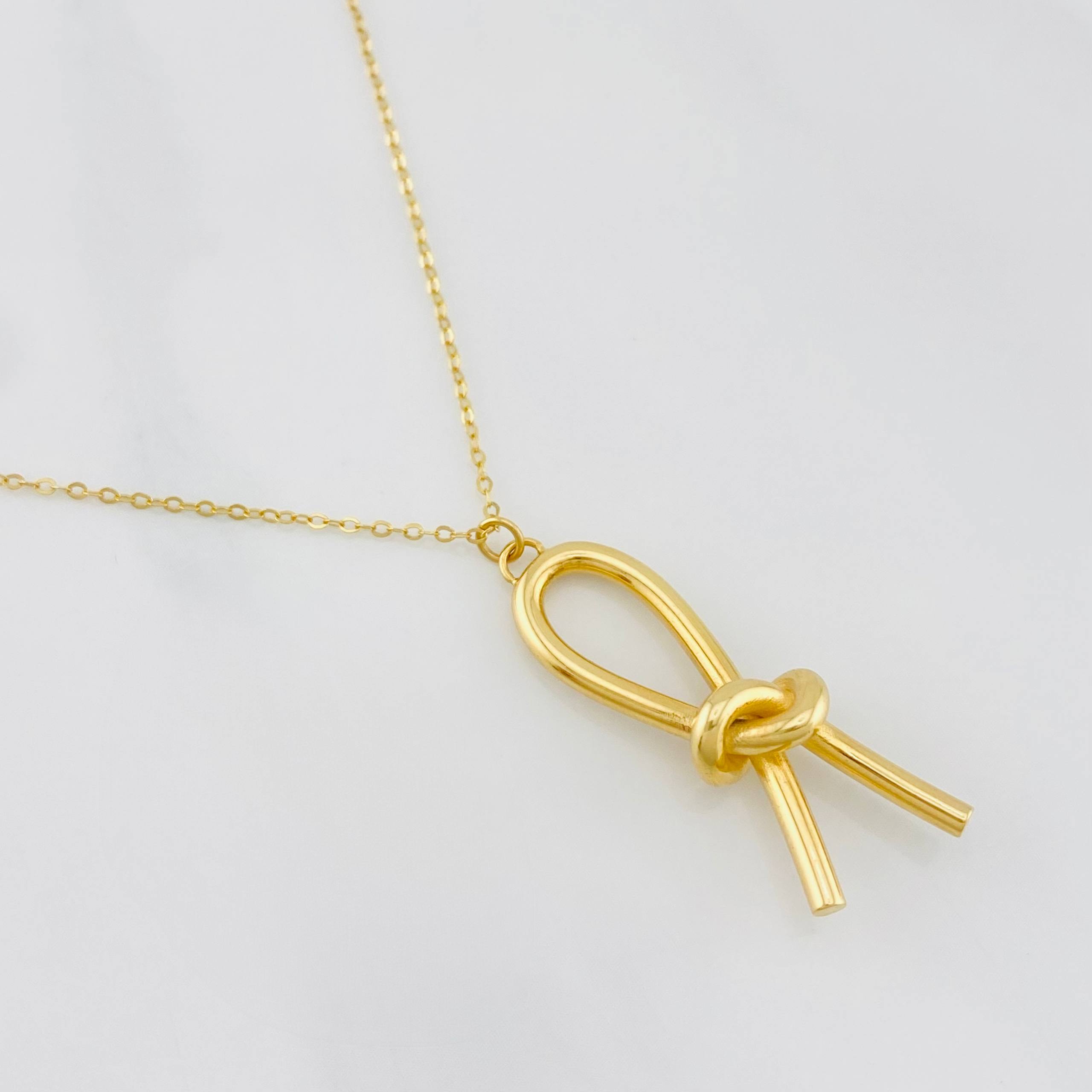 Cadena Aro seguido moño 2.65g / 17 3/4 in-16 1/2 in / 1mm Oro Amarillo 18K