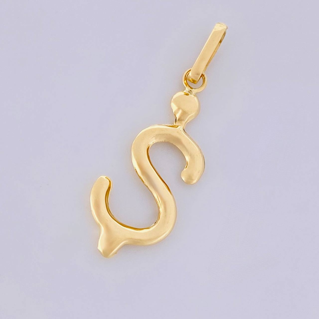 Dije Signo Pesos 0.8g / 1 1/4 in Oro Amarillo 18K