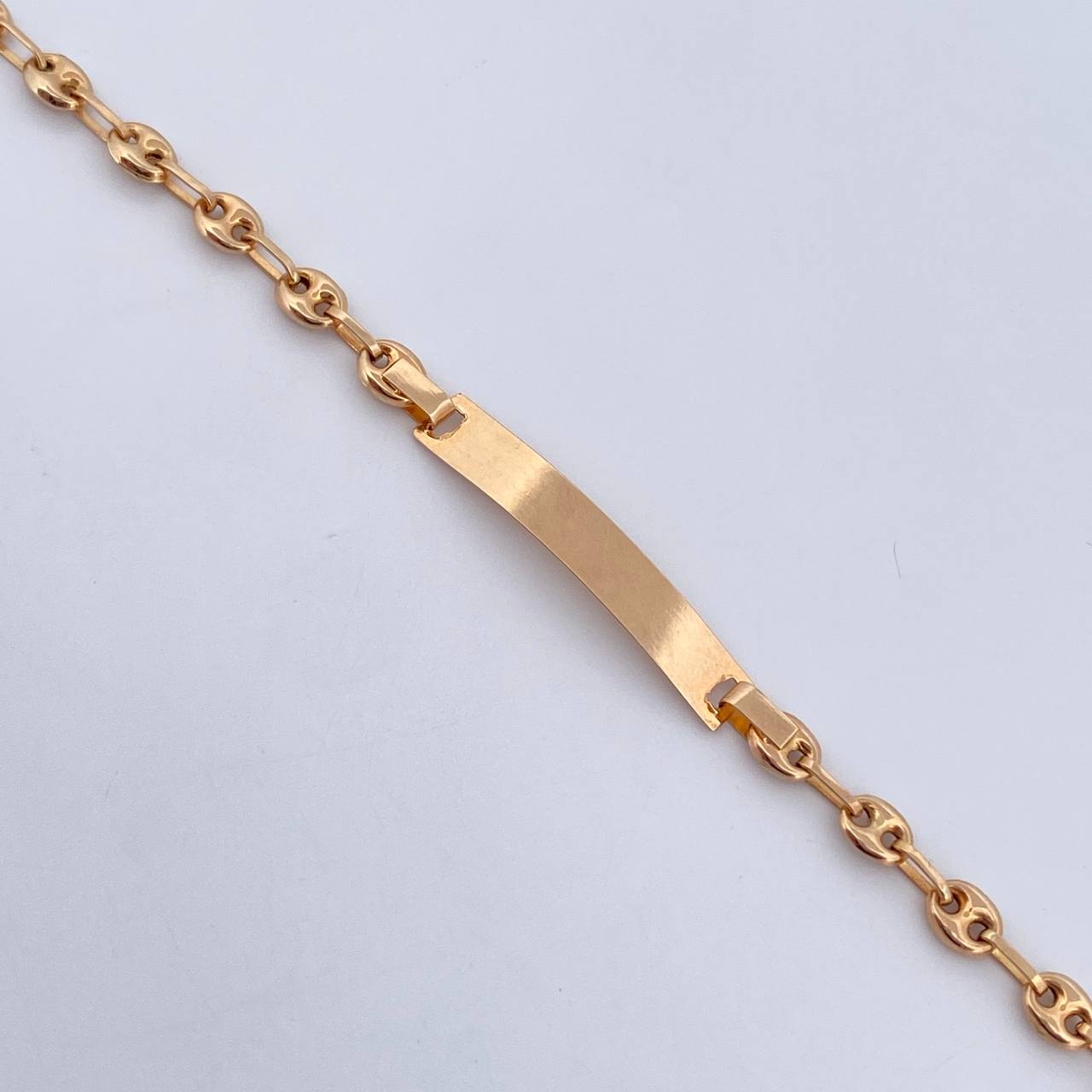 Pulso Bebé GC 1.7gr / 14.5cm / 3.8mm Placa Rectangular Curva Oro Amarillo 18K $
