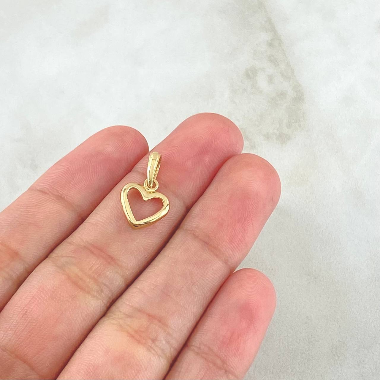 Dije Corazón Silueta 0.7gr / 1.7cm / Liso Oro Amarillo 18K