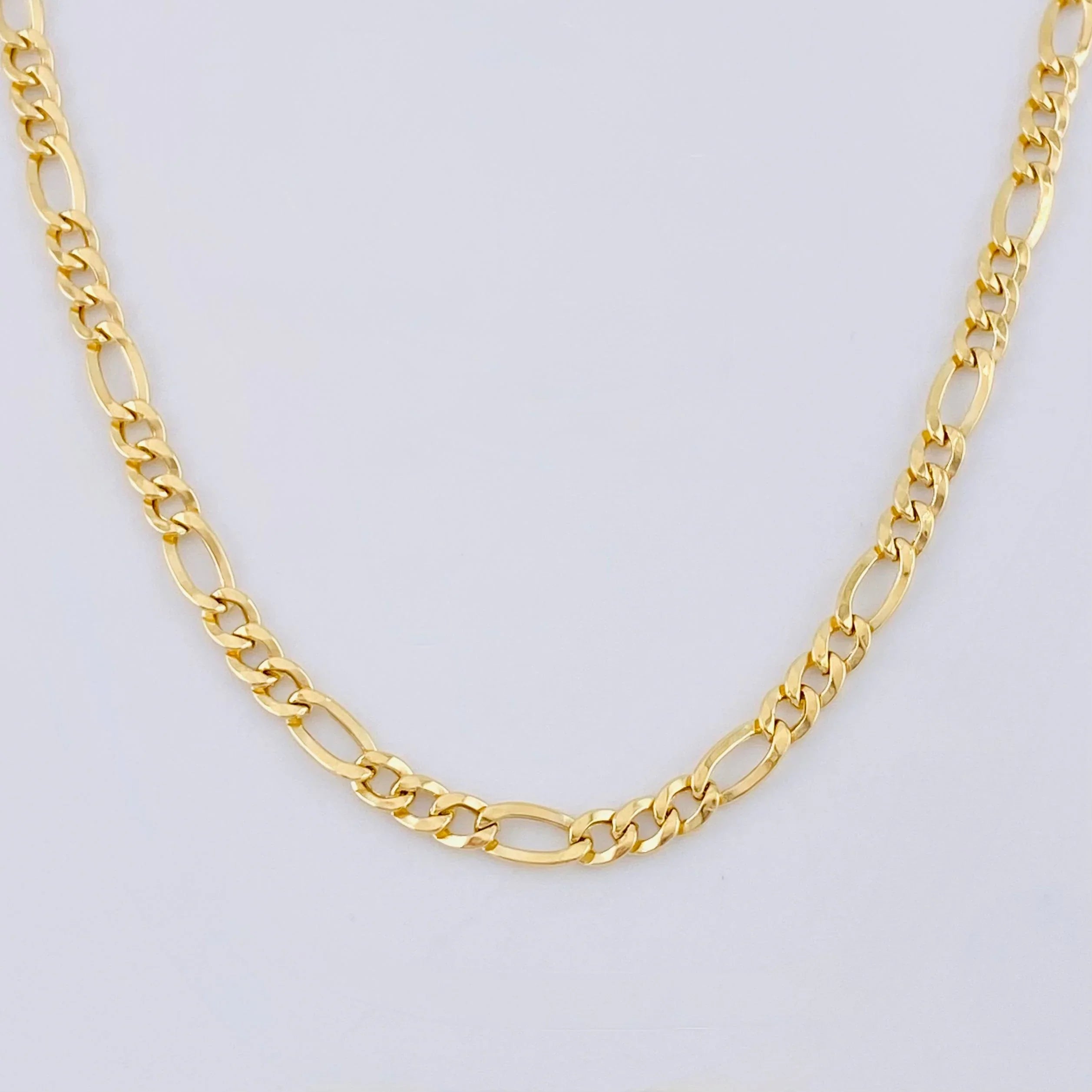 Cadena Figaro 7.75g / 24 in / 4.4mm Oro Amarillo 18K