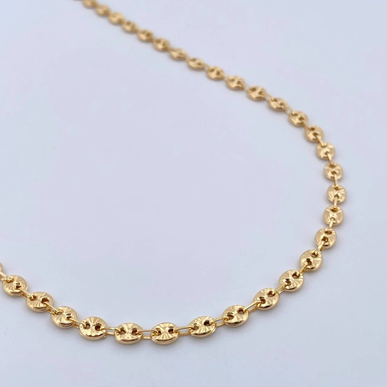 Cadena GC 12.15gr / 23 in / 4mm Oro Amarillo 18K $