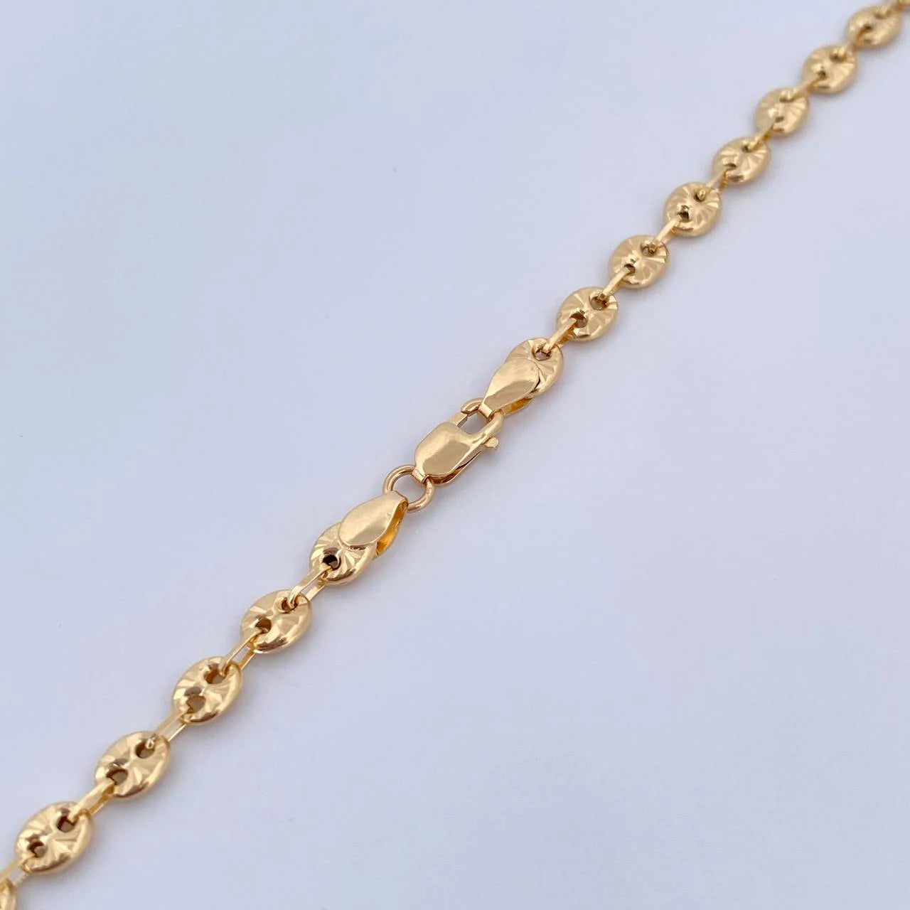 Cadena GC 12.15gr / 23 in / 4mm Oro Amarillo 18K $