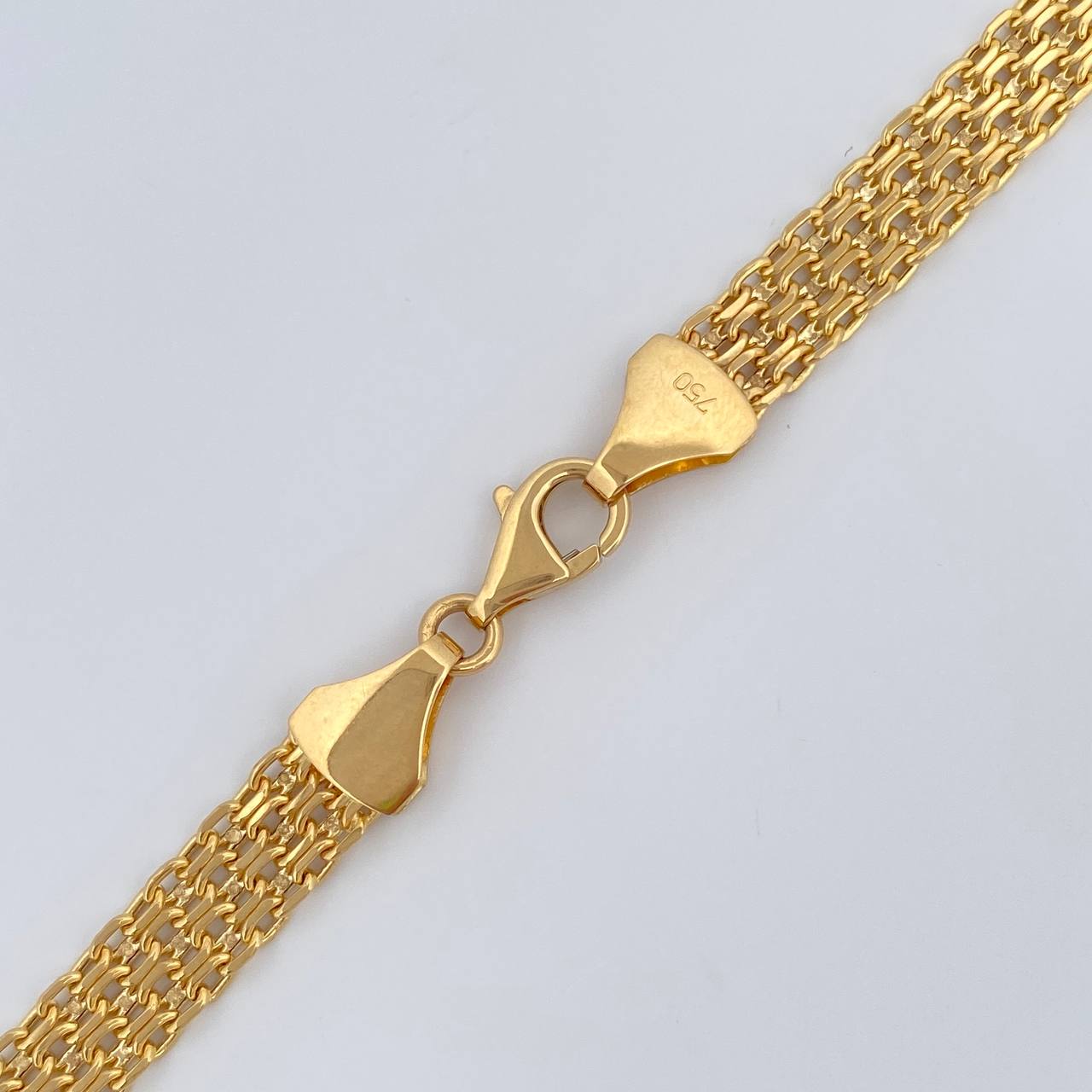 Cadena China 15.5gr / 60.5cm / +0 Oro 18K $