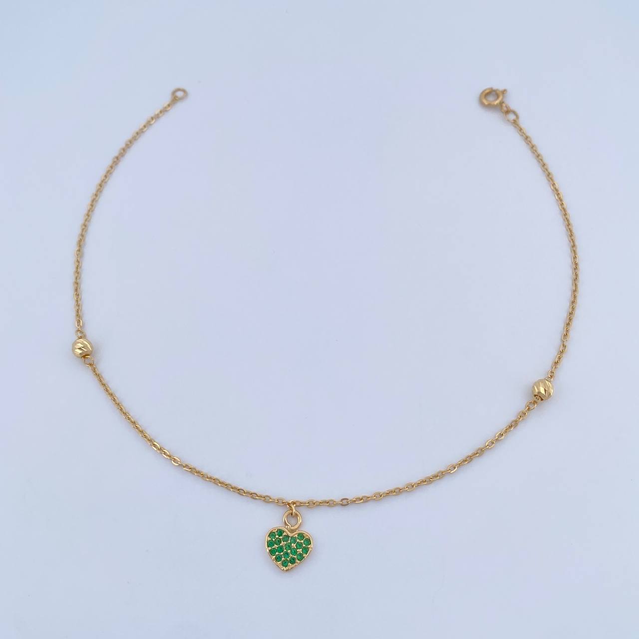 Tobillera Aro Seguido Corazon 2.1gr / 25.2cm / 4mm Bolas Diamantadas Circones Verdes Oro Amarillo 18K &