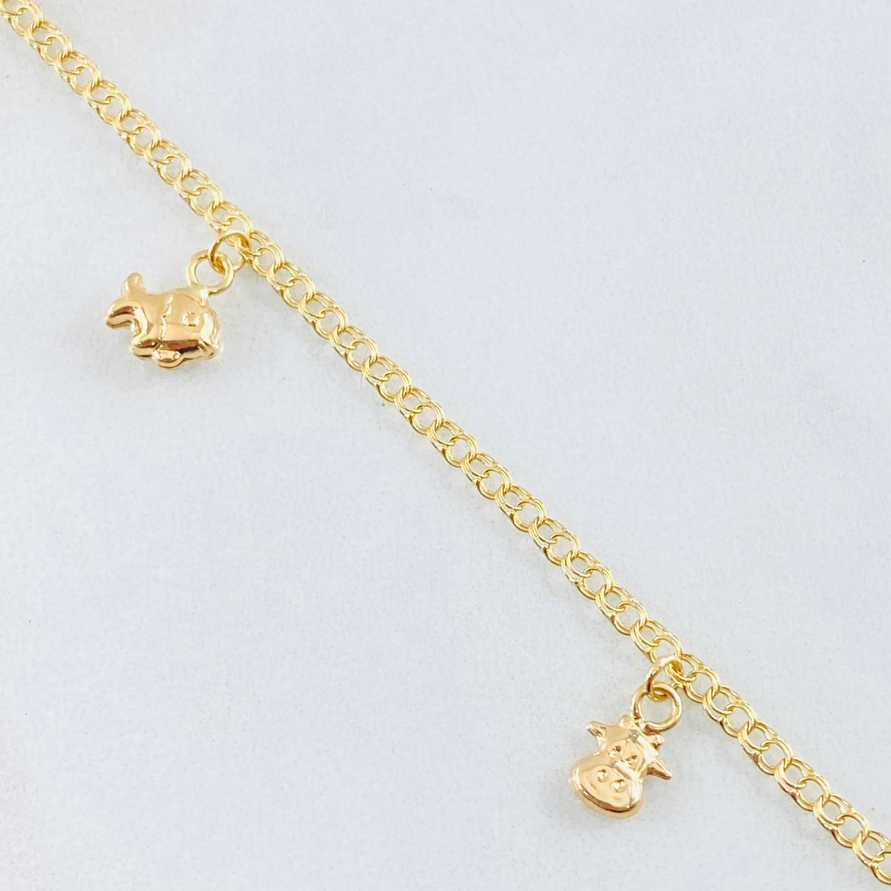 Tobillera Aro Seguido Dijes 3.7gr / 10 1/4 in / Oro Amarillo 18K *