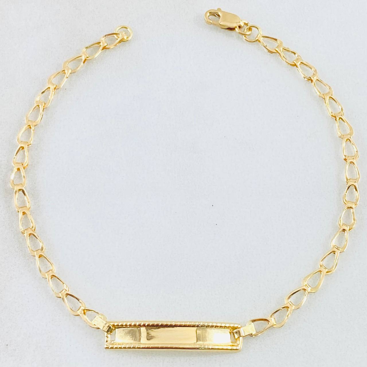 Pulso Bebé Espiga 1.25gr / 6 1/2 in / Oro Amarillo 18K