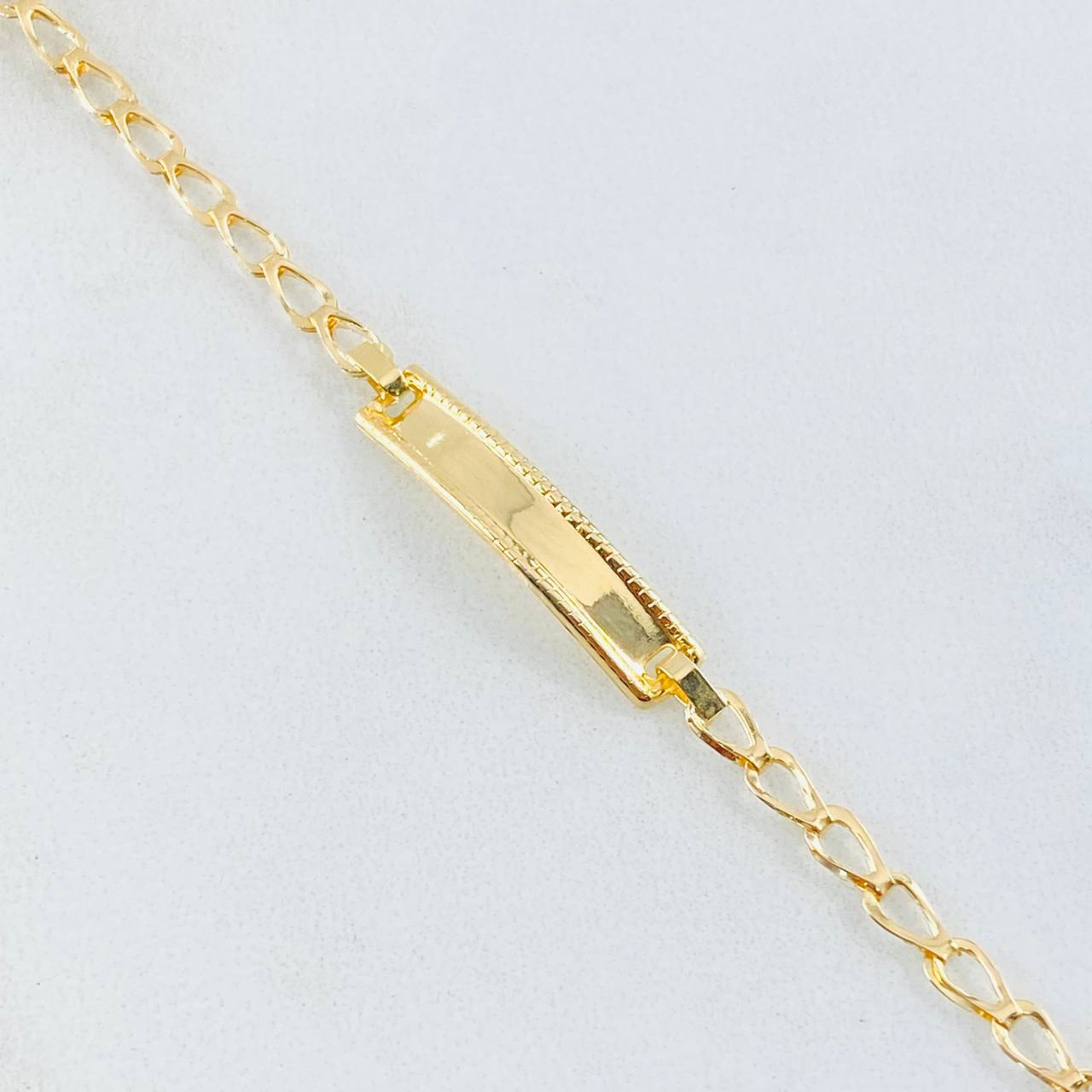 Pulso Bebé Espiga 1.25gr / 6 1/2 in / Oro Amarillo 18K