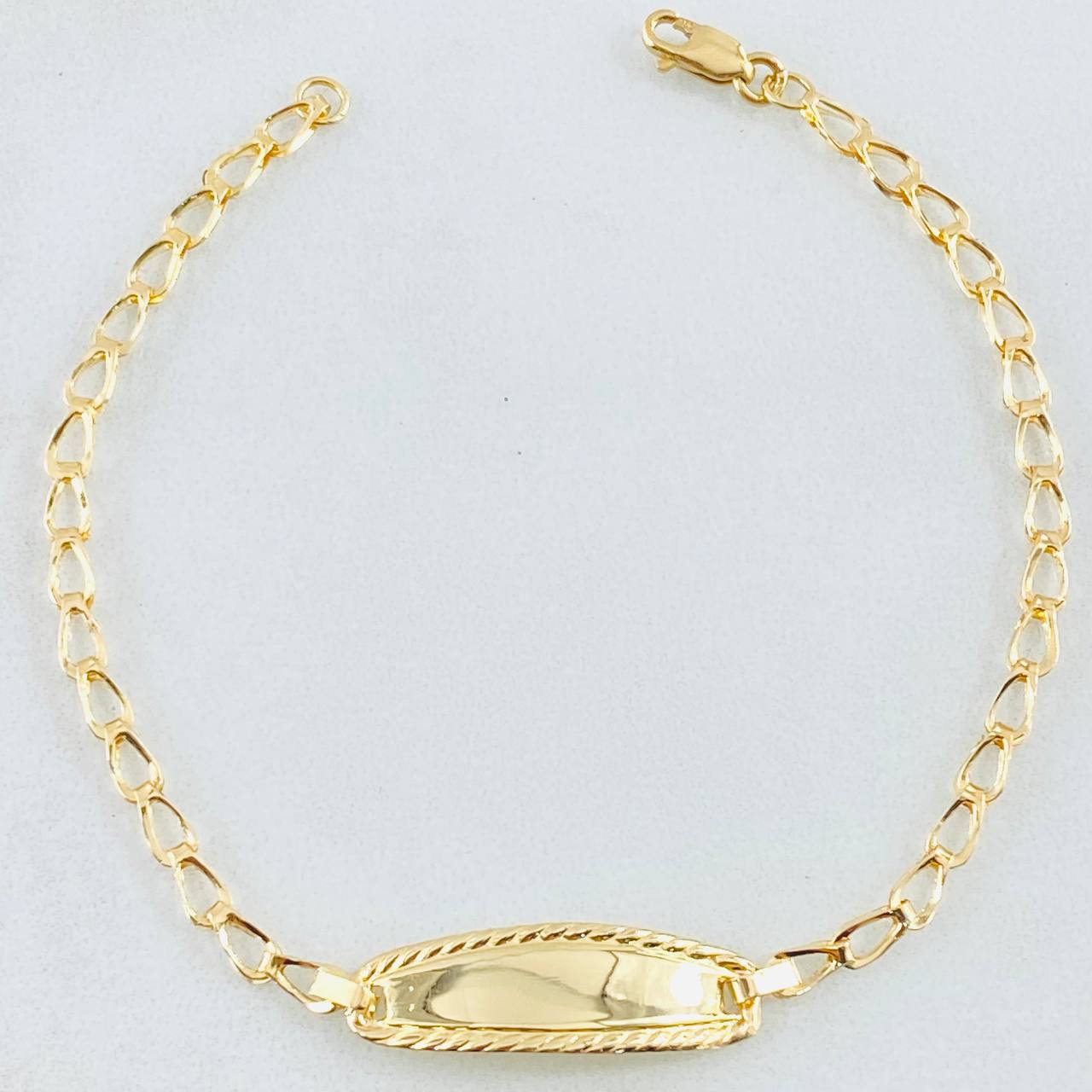 Pulso Bebé Espiga 1.35gr / 6 1/4 in / Oro Amarillo 18K