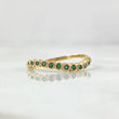 Wavy Circles Ring 1.8gr / Size 7 1/4 / Green Zircons Yellow Gold